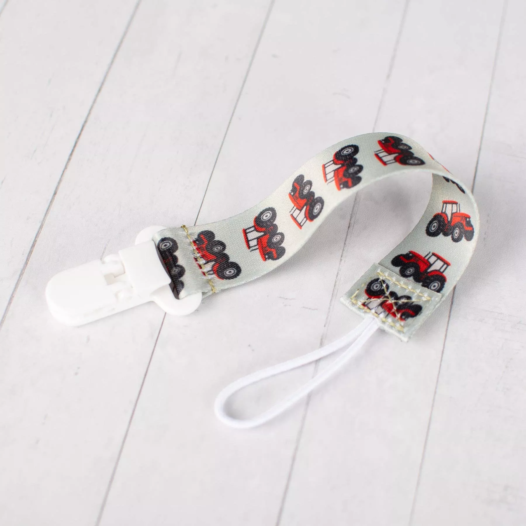 red tractor paci clip