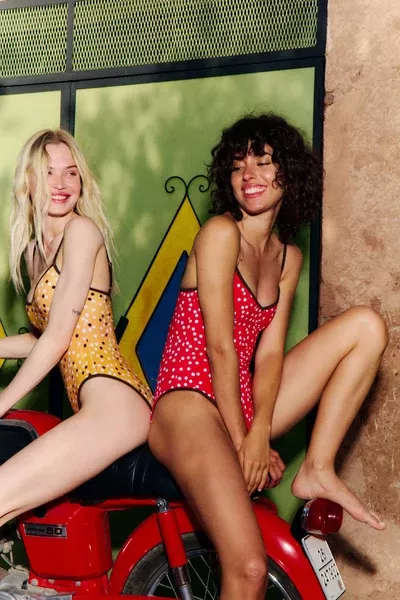 The Shea One Piece in Marigold Ikat Dot