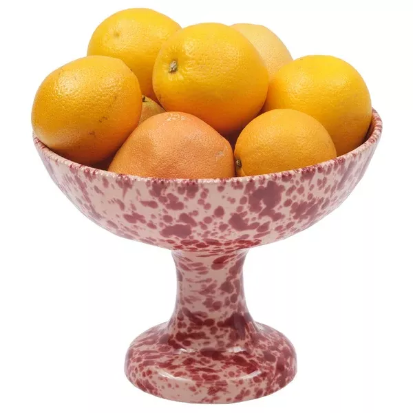Speckled fruit stand in pink